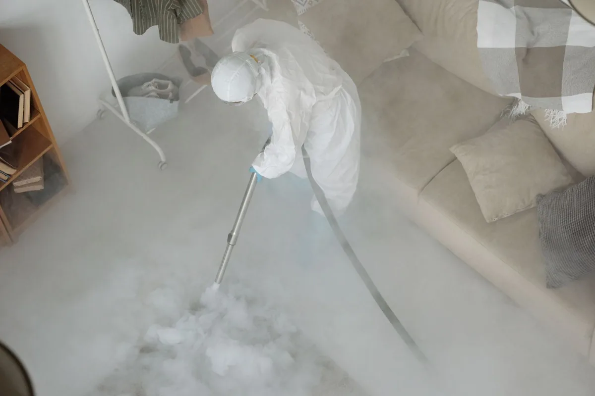 Biohazard cleanup technician in protective equipment, South Wenatchee, WA